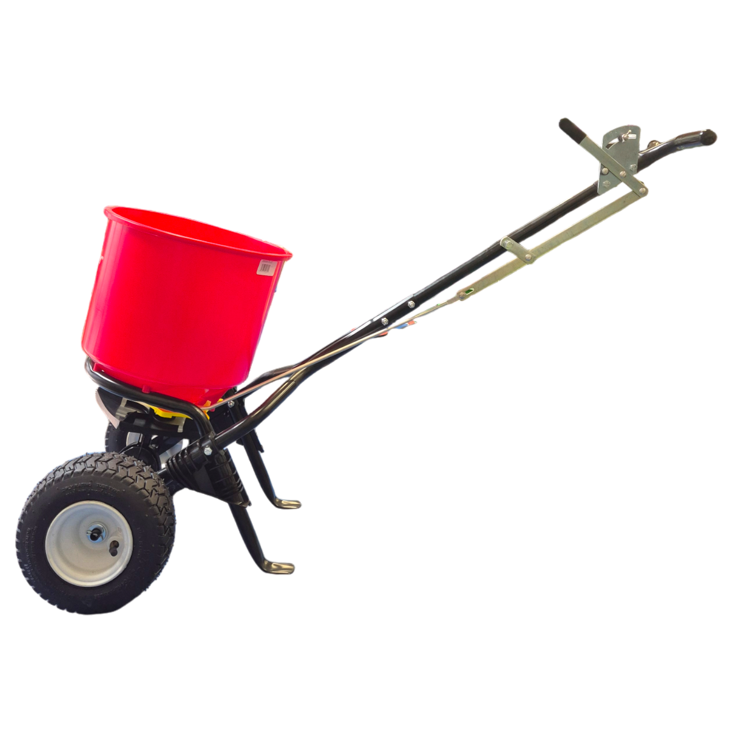 EarthWay 2600A heavy-duty broadcast spreader showing 22cm high-flotation pneumatic tyres for smooth operation on uneven terrain