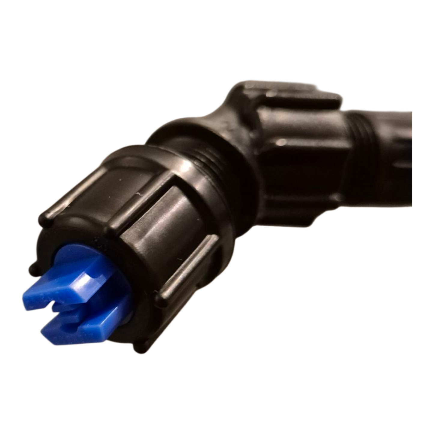 Close-up of a black mechanical component with a blue part on a white background