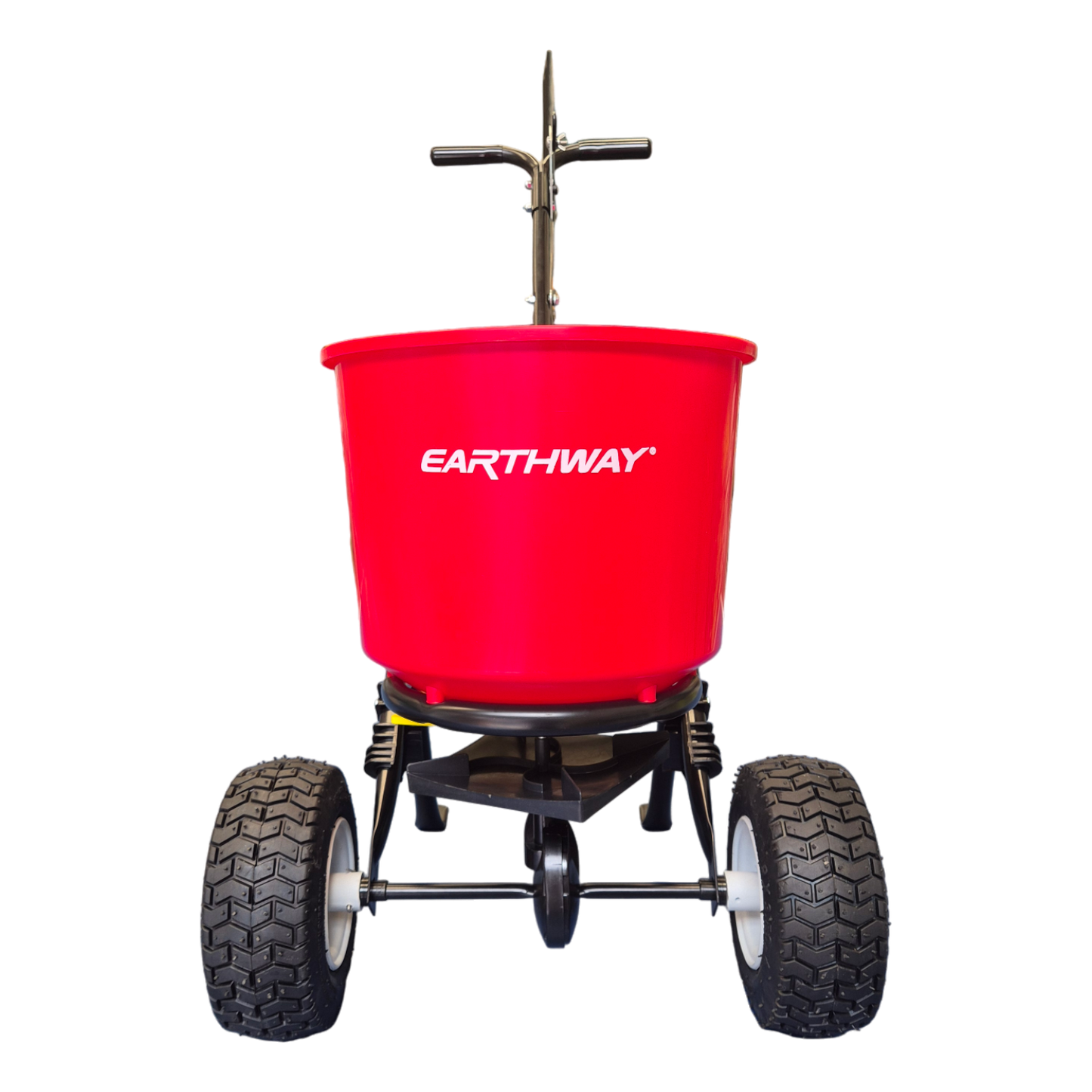 EarthWay 2600A broadcast spreader applying fertiliser and grass seed evenly across Australian lawn