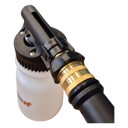 Mighty Goat Lawns hose-on sprayer connected to garden hose for lawn fertiliser application
