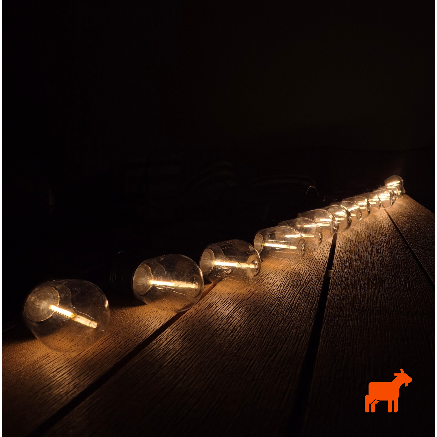 Solar garden festoon lights by Mighty Goat Lawns showing outdoor waterproof string lighting setup