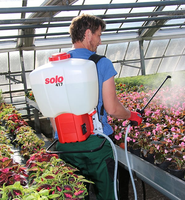 Solo 417Li 18L battery backpack sprayer being worn showing padded shoulder straps and ergonomic frame